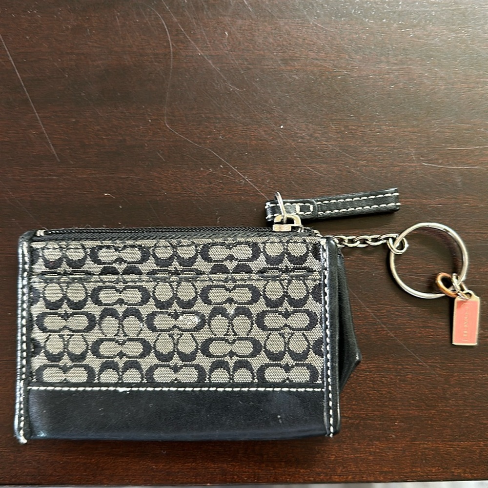 Authentic Coach card holder in black with white stitching